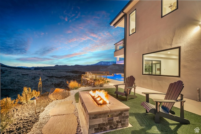 599 W 170 S, La Verkin, UT 84745 - view of patio featuring an outdoor fire pit and a mountain view