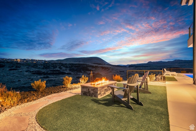 599 W 170 S, La Verkin, UT 84745 - exterior space featuring an outdoor fire pit, a mountain view, and a patio area