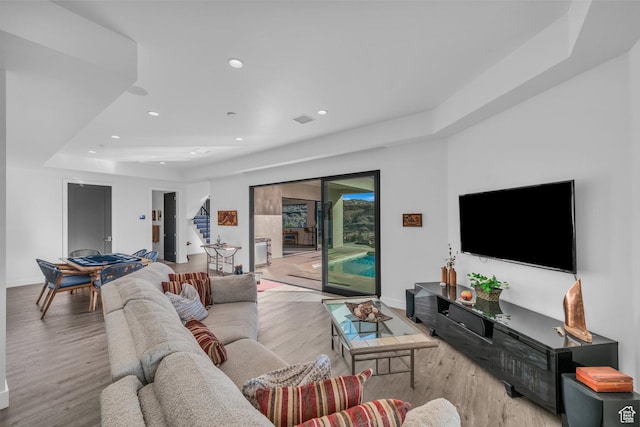 599 W 170 S, La Verkin, UT 84745 - living area featuring recessed lighting, a tray ceiling, baseboards, and wood finished floors
