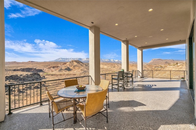 599 W 170 S, La Verkin, UT 84745 - view of patio / terrace with a balcony, a mountain view, and outdoor dining space