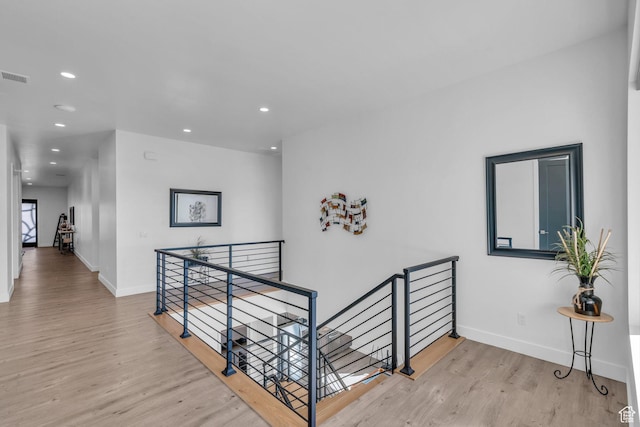 599 W 170 S, La Verkin, UT 84745 - hall with baseboards, wood finished floors, an upstairs landing, and recessed lighting