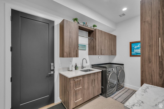 599 W 170 S, La Verkin, UT 84745 - laundry room with washer and clothes dryer, a sink, baseboards, visible vents, and cabinet space
