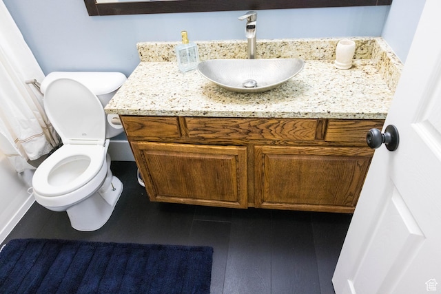 301 E 2700 S Unit 16, South Salt Lake, UT 84115 - bathroom featuring toilet and vanity