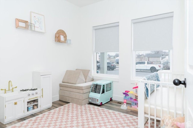 602 W 20 N, Hyrum, UT 84319 - bedroom with baseboards and wood finished floors