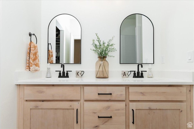 602 W 20 N, Hyrum, UT 84319 - bathroom featuring a sink and double vanity