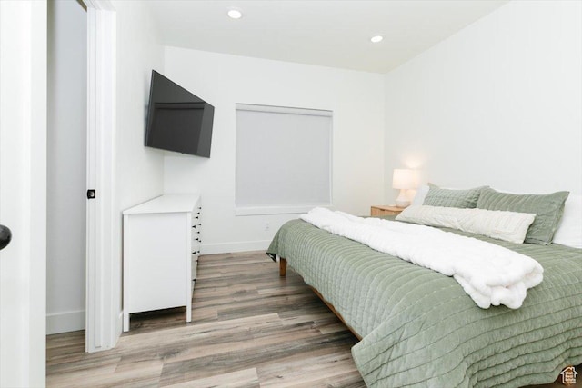 602 W 20 N, Hyrum, UT 84319 - bedroom with baseboards, wood finished floors, and recessed lighting