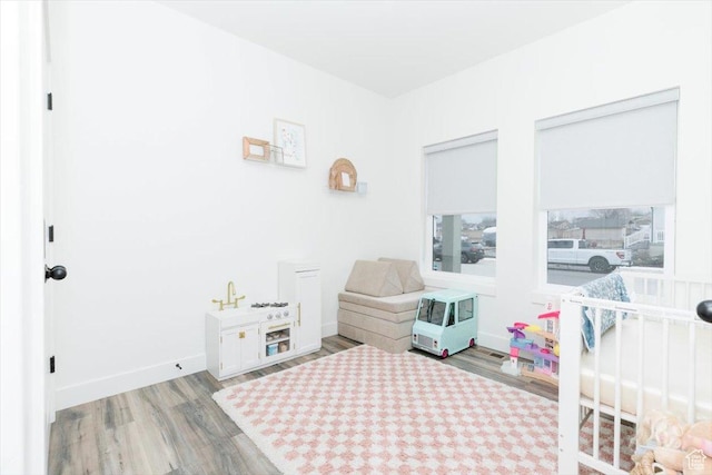 602 W 20 N, Hyrum, UT 84319 - rec room with baseboards and wood finished floors