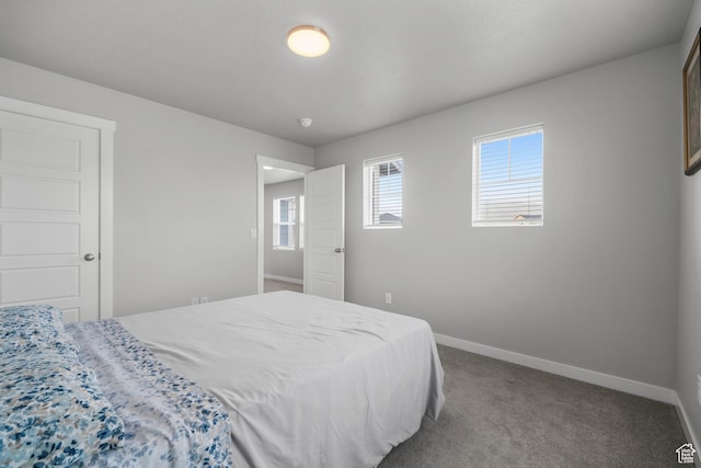 13099 S Twisted Oak Dr, Herriman, UT 84096 - bedroom featuring baseboards and carpet floors