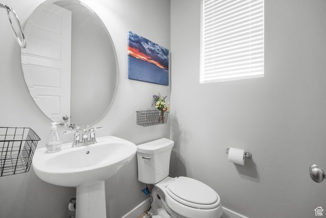 13099 S Twisted Oak Dr, Herriman, UT 84096 - bathroom featuring baseboards and toilet