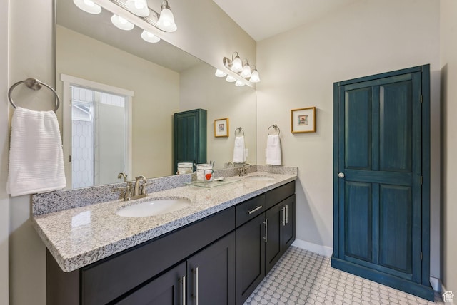 5265 N Laurelwood St N, Heber City, UT 84032 - bathroom featuring double vanity, baseboards, and a sink