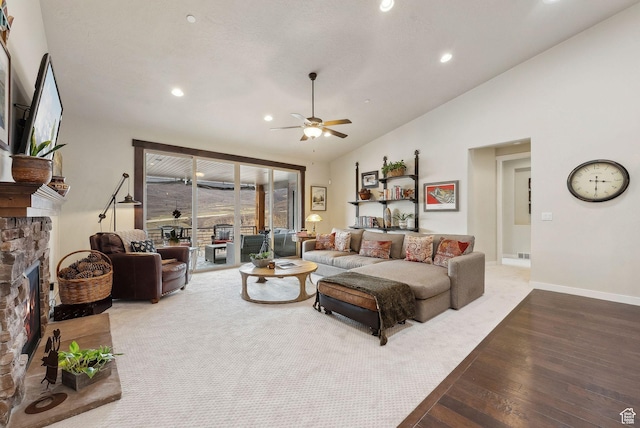 5265 N Laurelwood St N, Heber City, UT 84032 - living room featuring a stone fireplace, a ceiling fan, recessed lighting, vaulted ceiling, and hardwood / wood-style floors