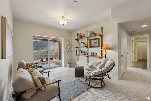 5265 N Laurelwood St N, Heber City, UT 84032 - living area with visible vents, light colored carpet, and baseboards