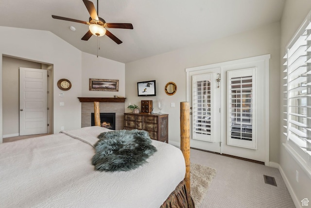 5265 N Laurelwood St N, Heber City, UT 84032 - carpeted bedroom featuring access to outside, a lit fireplace, multiple windows, and lofted ceiling