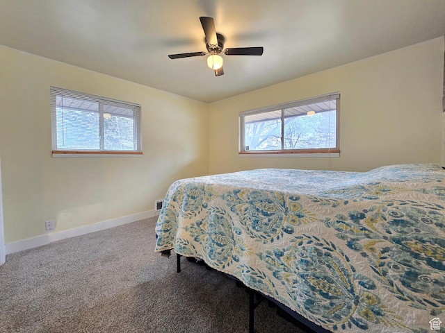 2084 Robins Ave, Ogden, UT 84401 - carpeted bedroom with baseboards and ceiling fan