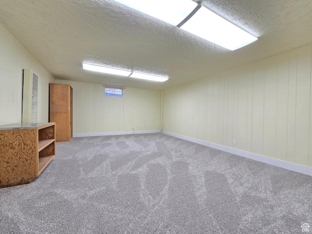 2084 Robins Ave, Ogden, UT 84401 - spare room featuring a textured ceiling, carpet, a heating unit, and baseboards