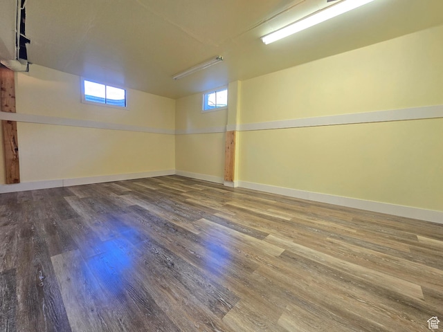 2084 Robins Ave, Ogden, UT 84401 - below grade area featuring wood finished floors, healthy amount of natural light, and baseboards