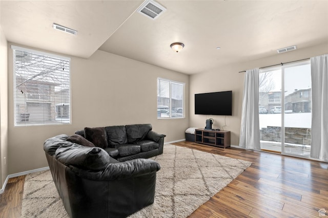 6613 W Ivy Gable Dr, West Jordan, UT 84081 - living area with baseboards and wood finished floors