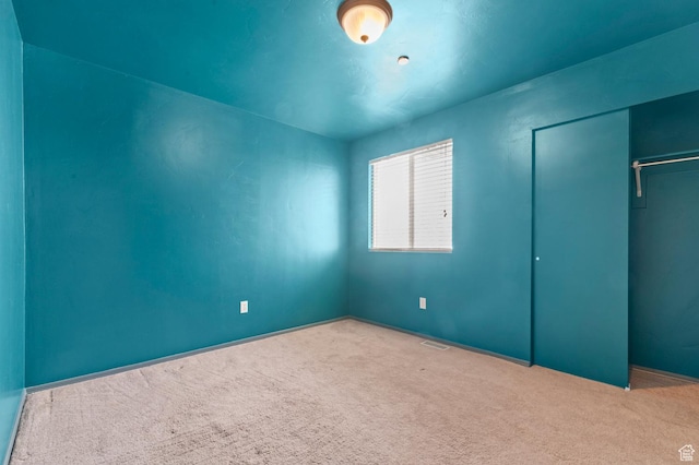 6613 W Ivy Gable Dr, West Jordan, UT 84081 - unfurnished bedroom featuring carpet floors, a closet, and baseboards