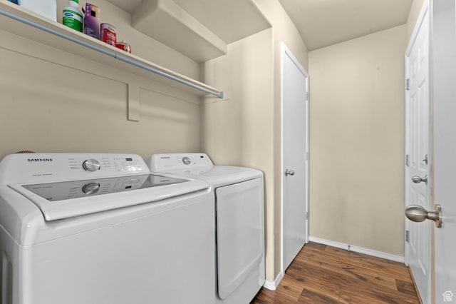 6613 W Ivy Gable Dr, West Jordan, UT 84081 - laundry room featuring washer and clothes dryer, dark wood-style floors, and baseboards