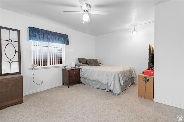 170 E 400 N, Mount Pleasant, UT 84647 - bedroom featuring baseboards, carpet floors, and a ceiling fan