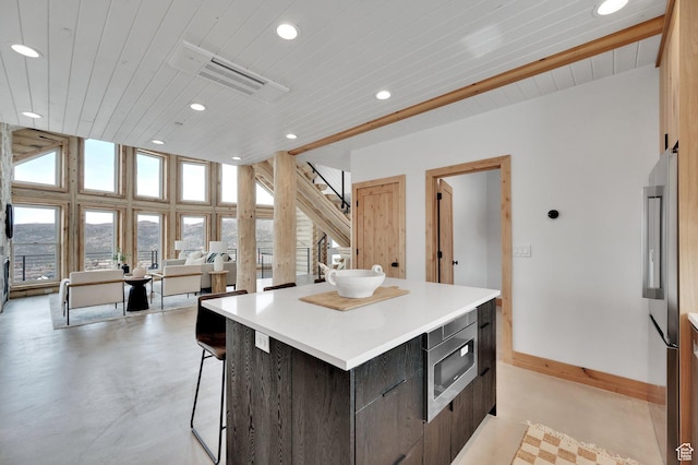 2032 Timber Lakes Dr Unit 950, Heber City, UT 84032 - kitchen featuring appliances with stainless steel finishes, modern cabinets, a center island, and finished concrete floors