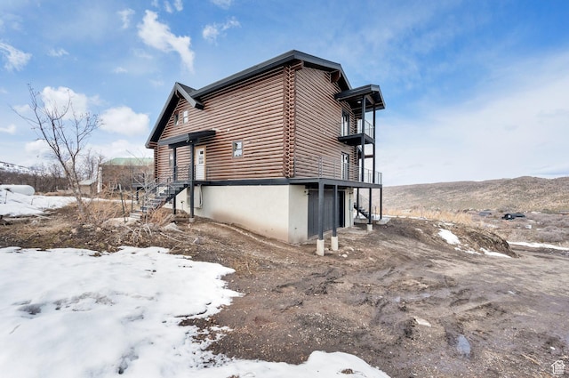 2032 Timber Lakes Dr Unit 950, Heber City, UT 84032 - view of snow covered exterior featuring a balcony