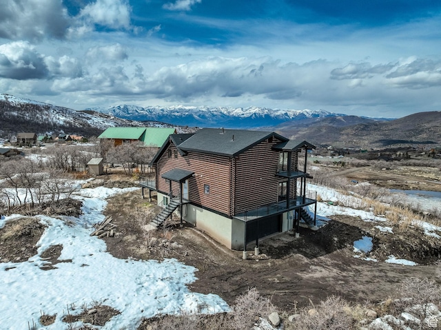 2032 Timber Lakes Dr Unit 950, Heber City, UT 84032 - view of snowy exterior with a mountain view and log exterior