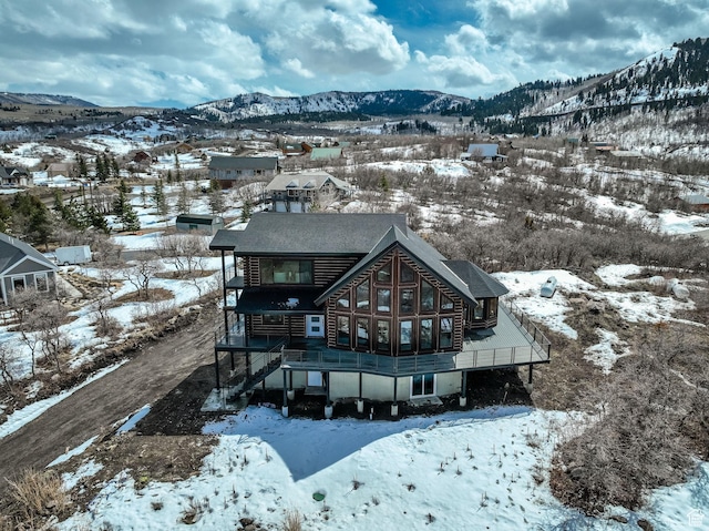2032 Timber Lakes Dr Unit 950, Heber City, UT 84032 - snow covered back of property with a mountain view and stairway