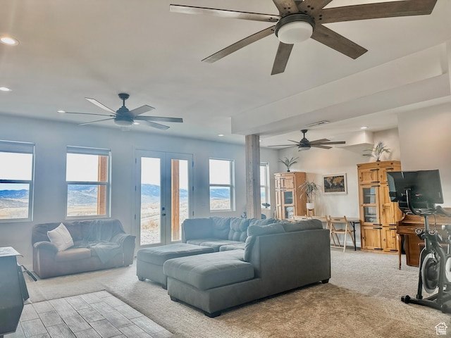 690 N Main St, Antimony, UT 84712 - living area featuring visible vents, ceiling fan, recessed lighting, light carpet, and french doors