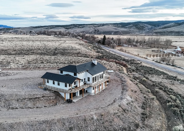 690 N Main St, Antimony, UT 84712 - birds eye view of property with a mountain view