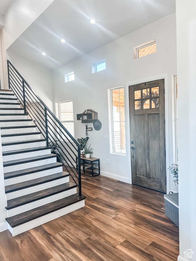 690 N Main St, Antimony, UT 84712 - entrance foyer featuring baseboards, recessed lighting, wood finished floors, and stairway