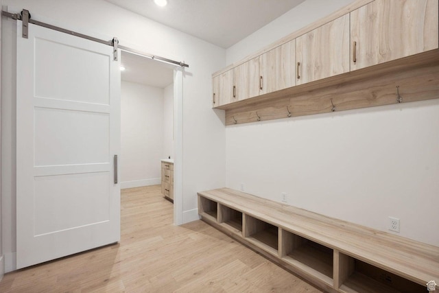 3087 E 2220 S, St George, UT 84790 - mudroom with a barn door, light wood-style floors, baseboards, and recessed lighting