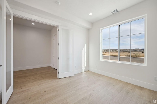 3087 E 2220 S, St George, UT 84790 - unfurnished room featuring baseboards, light wood-type flooring, recessed lighting, and a smoke detector
