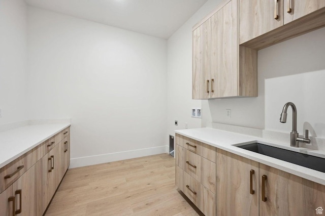 3087 E 2220 S, St George, UT 84790 - washroom featuring washer hookup, light wood finished floors, hookup for an electric dryer, cabinet space, and baseboards