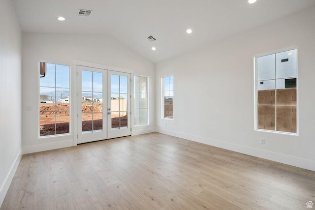 3087 E 2220 S, St George, UT 84790 - spare room featuring french doors, light wood-type flooring, vaulted ceiling, baseboards, and recessed lighting