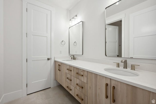 3087 E 2220 S, St George, UT 84790 - bathroom featuring double vanity and tile patterned floors