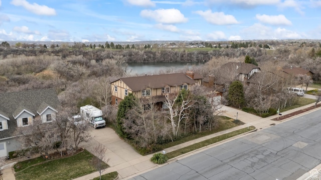 drone / aerial view featuring a water view