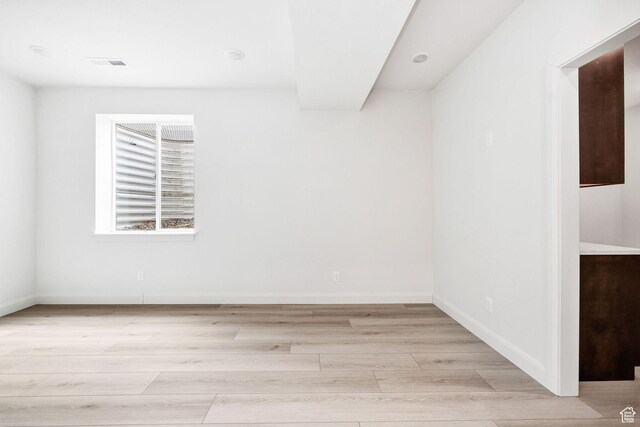 538 N 550 W, Smithfield, UT 84335 - unfurnished room with baseboards, light wood finished floors, and visible vents