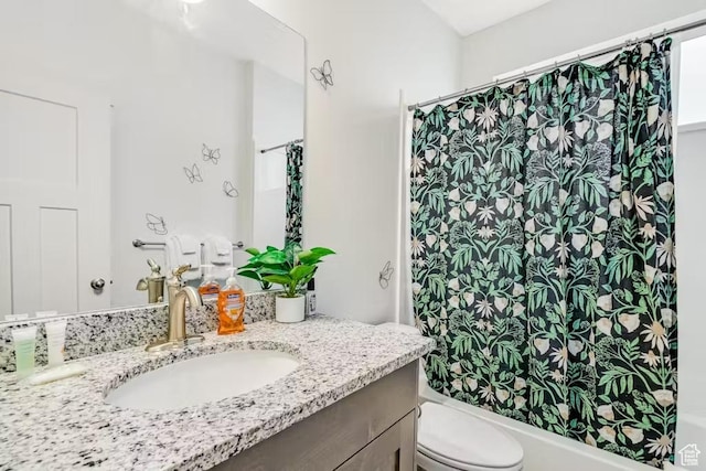 2233 S Beachcomber Ln, Garden City, UT 84028 - full bathroom featuring toilet and vanity