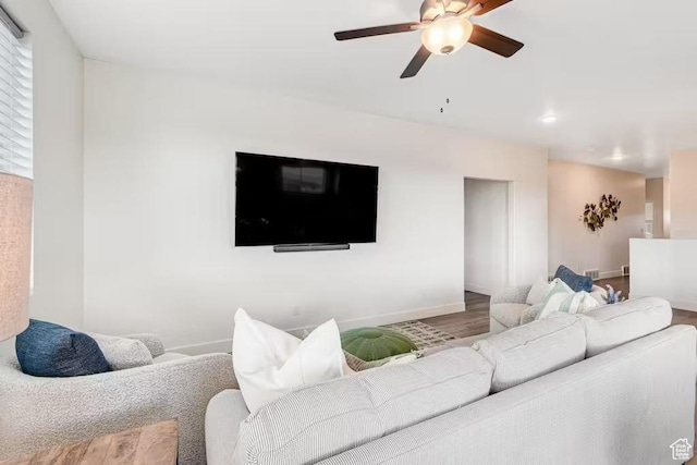 2233 S Beachcomber Ln, Garden City, UT 84028 - living room with baseboards, ceiling fan, and wood finished floors