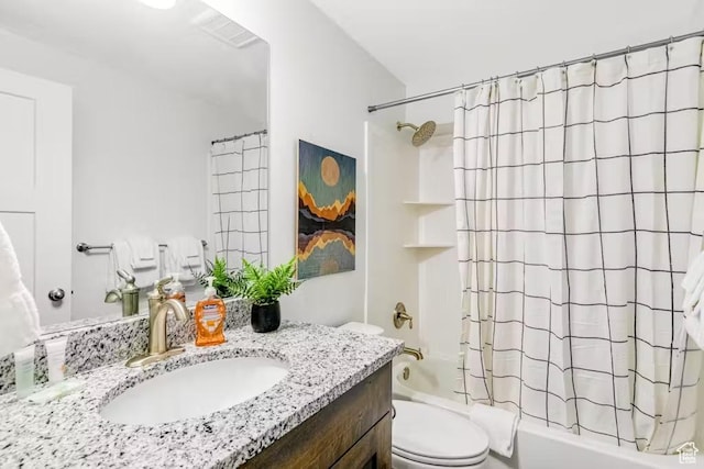 2233 S Beachcomber Ln, Garden City, UT 84028 - bathroom featuring toilet, shower / bath combination with curtain, and vanity