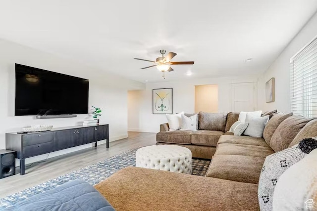 2233 S Beachcomber Ln, Garden City, UT 84028 - living area featuring a ceiling fan, baseboards, and wood finished floors