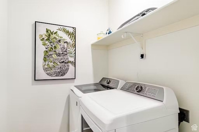 2233 S Beachcomber Ln, Garden City, UT 84028 - washroom featuring washing machine and dryer and laundry area