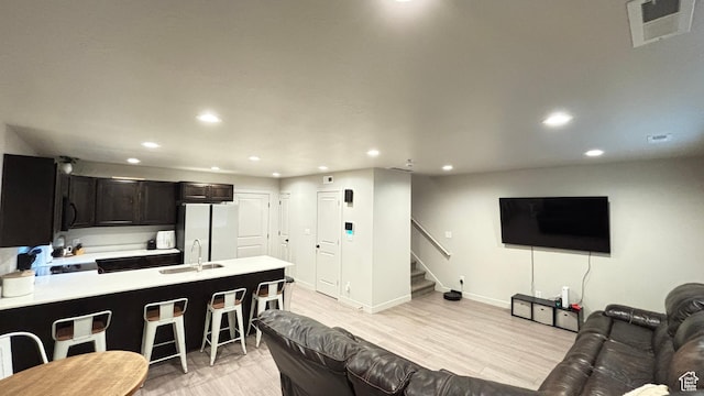 1794 N 1260 E, Payson, UT 84651 - living room with light wood-style flooring, visible vents, baseboards, stairs, and recessed lighting