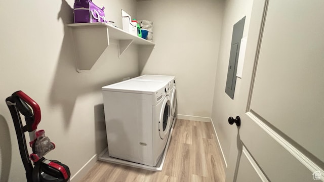 1794 N 1260 E, Payson, UT 84651 - laundry area featuring washer and clothes dryer, baseboards, light wood-style floors, laundry area, and electric panel