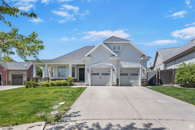 5025 N Shady Bend Ln, Lehi, UT 84043 - view of front of home featuring concrete driveway, covered porch, and board and batten siding