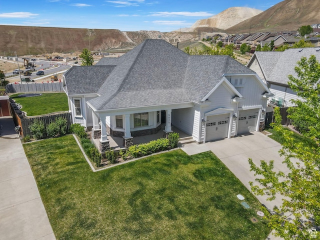 5025 N Shady Bend Ln, Lehi, UT 84043 - view of front of property with a shingled roof, concrete driveway, a garage, and a porch