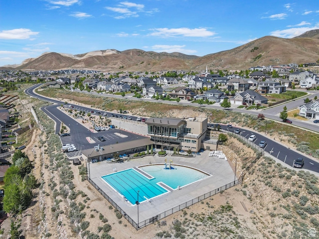 5025 N Shady Bend Ln, Lehi, UT 84043 - aerial perspective of suburban area with a pool area and mountains