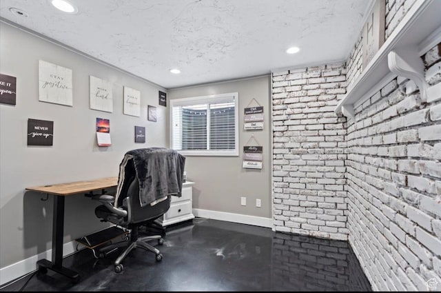 home office with baseboards, recessed lighting, brick wall, and a textured ceiling