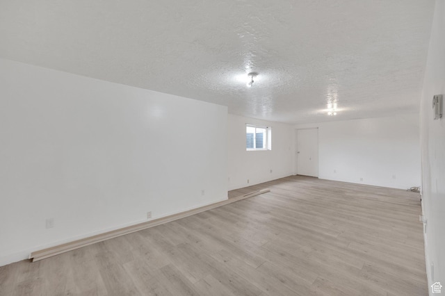 6102 W 13400 S, Herriman, UT 84096 - empty room with a textured ceiling and light wood finished floors